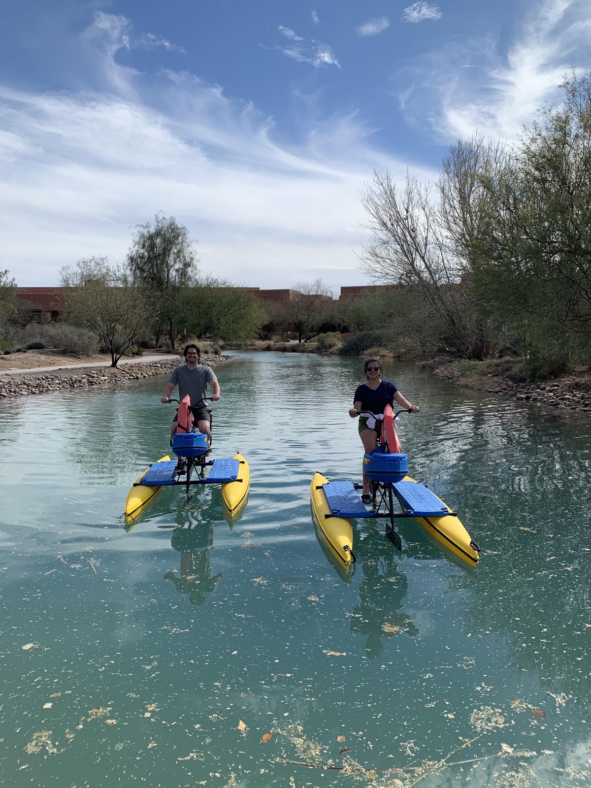 Evan and Joselyn riding water bikes